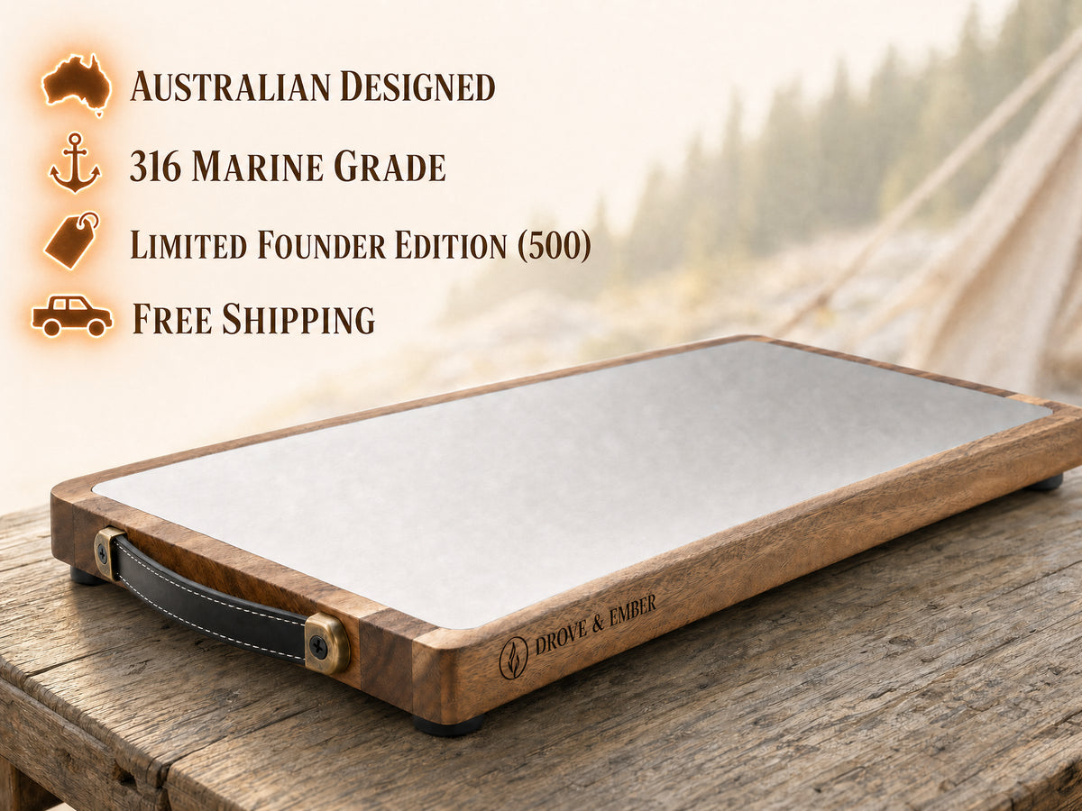 The Bedrock on a camp table outdoors: 316 marine-grade stainless bonded to hand-selected hardwood, Australian designed, Limited Founders Edition of 500, free shipping Australia-wide